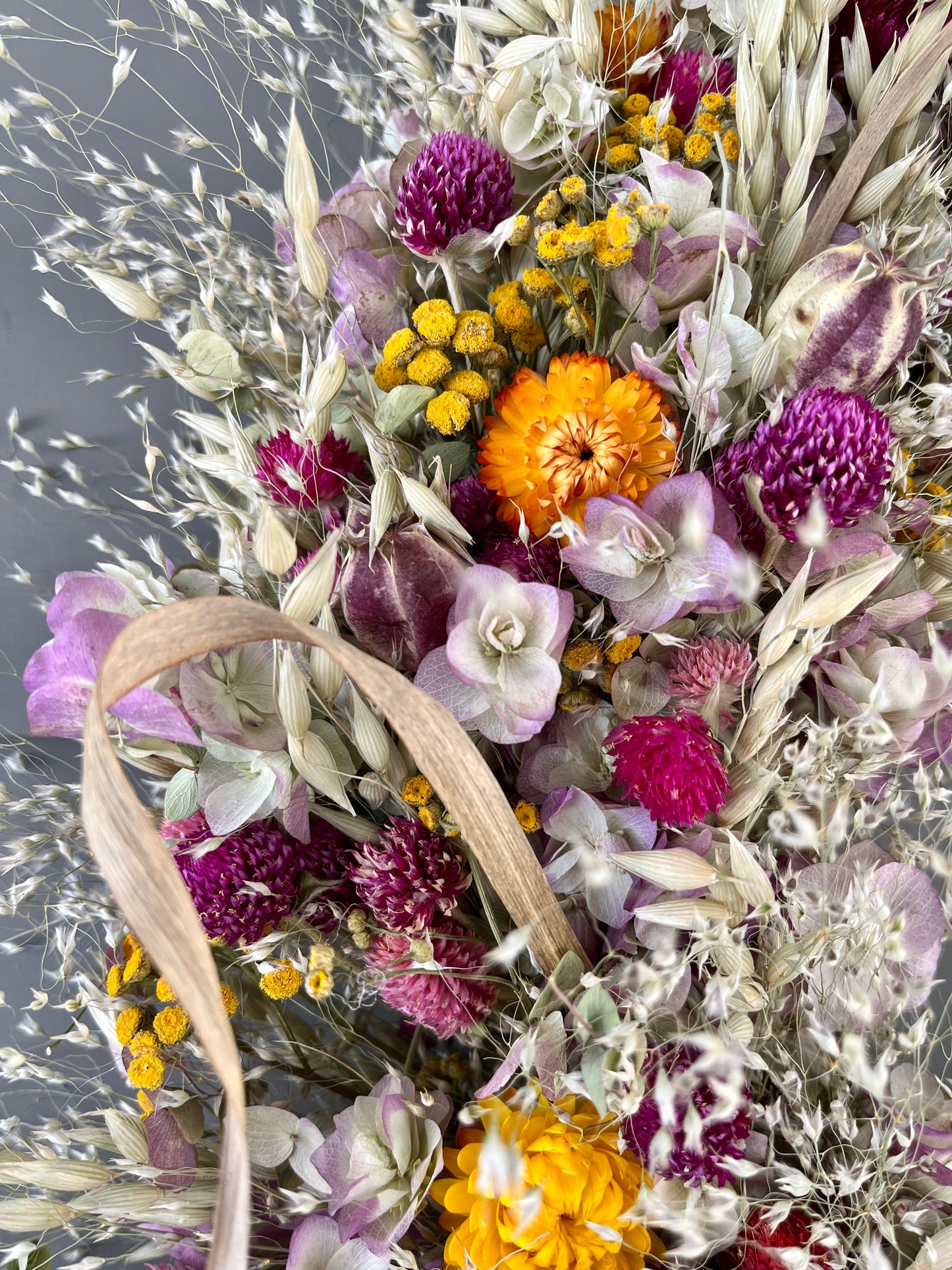 Rice grass and gomphrena wreath