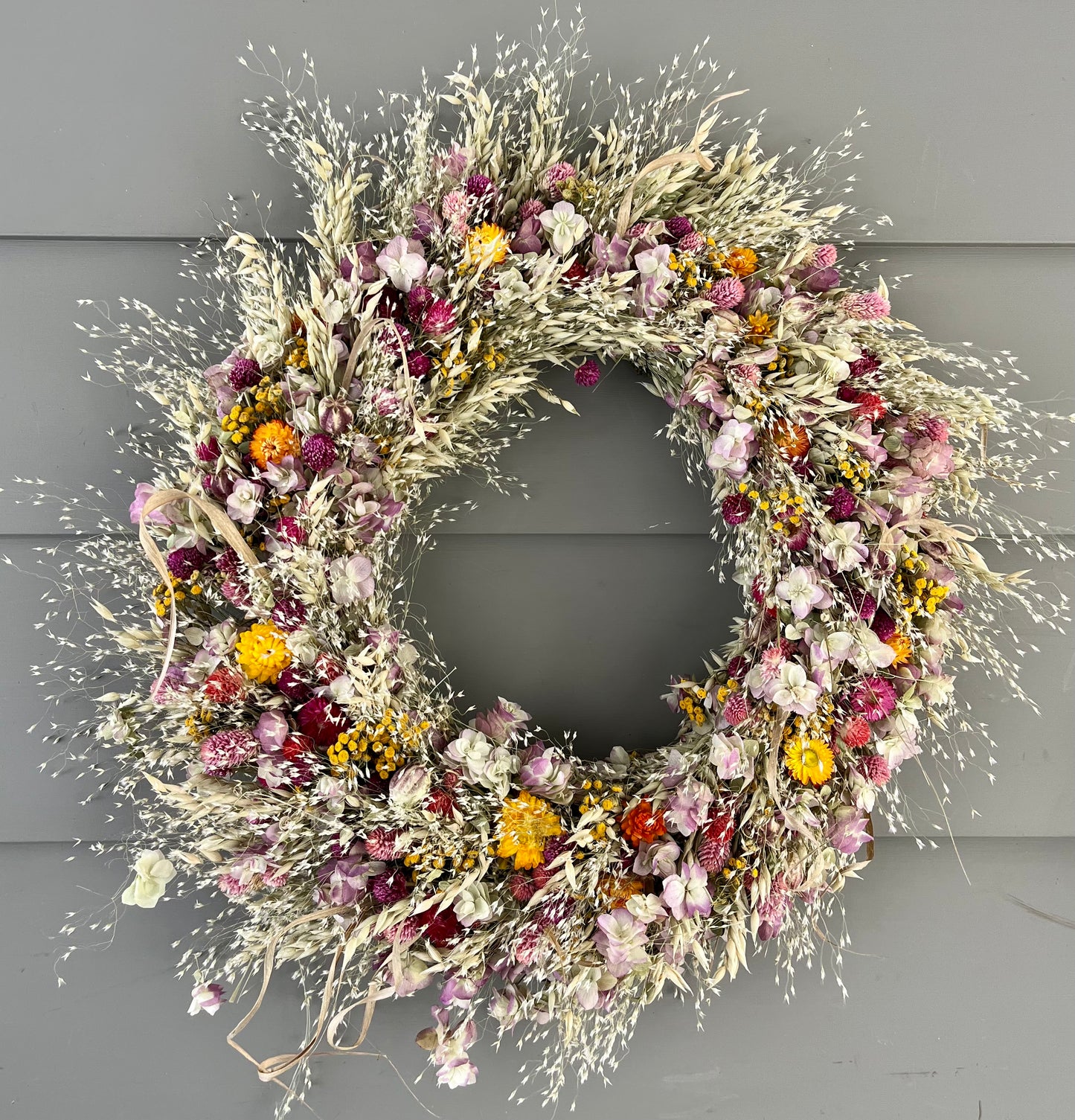 Rice grass and gomphrena wreath